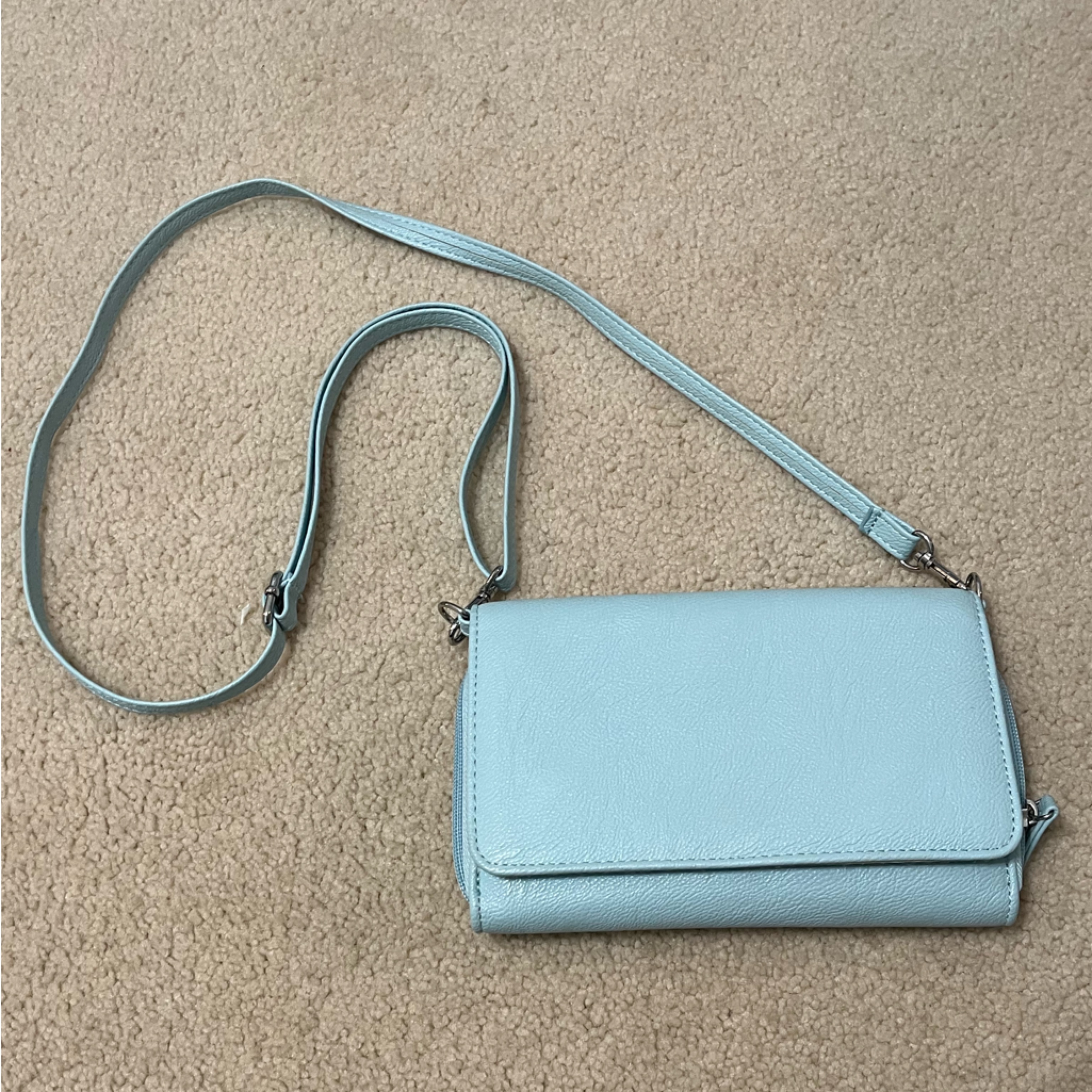 Light Blue Purse Used As A Crossbody Bag Or Clutch